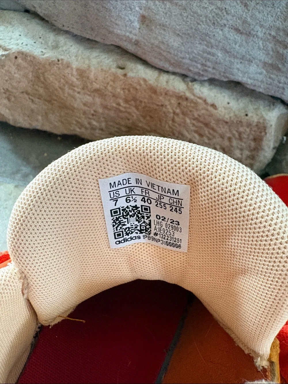 Adidas orange athletic shoes